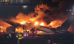 Japonya Tokyo'da pistte yanan uçak son durum