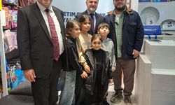 TDV'den Gürcistan'da 650 yetime giyim yardımı