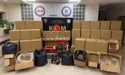 Manisa'da kaçak sigara ve silah operasyonu