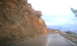 Mersin'de cipin kaya parçalarının altında kaldığı heyelan kamerada