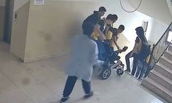 Okulun asansörü arızalandı, müdür yardımcısı bedensel engelli öğrencisini sırtında taşıdı; o anlar kamerada