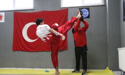Ağabeyinin teşvikiyle başladığı kick boksta dünya şampiyonu oldu