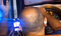 Esenyurt'ta direksiyon başında video izleyen minibüs şoförü kamerada