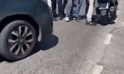 Kartal'da motokuryeyle kavga ederken aracını geri viteste unutan sürücü kaza yaptı
