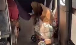 Keçisiyle dolmuşa bindi, yol boyunca başını okşadı