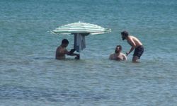 Sıcak havayı fırsat bilen İstanbullular sahillere akın etti