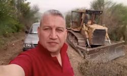 Muğla'da evlere yaklaşan alevleri dozeriyle durdurmaya çalıştı
