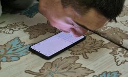 Burnu ile cep telefonu kullanan 'serebral palsili' Osman'ın hedefi kitap yazmak