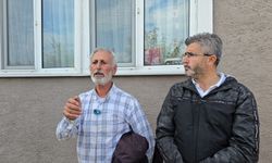 Kaçak evinin yıkımına engel olmak için benzin bidonuyla çatıya çıktı