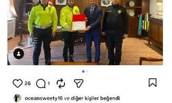 Yaralı ıslanmasın diye başında şemsiyeyle bekleyen kadın polise başarı belgesi