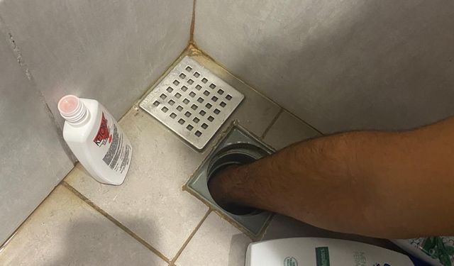 Isparta'da eli banyo giderine sıkışan kişiyi itfaiye kurtardı